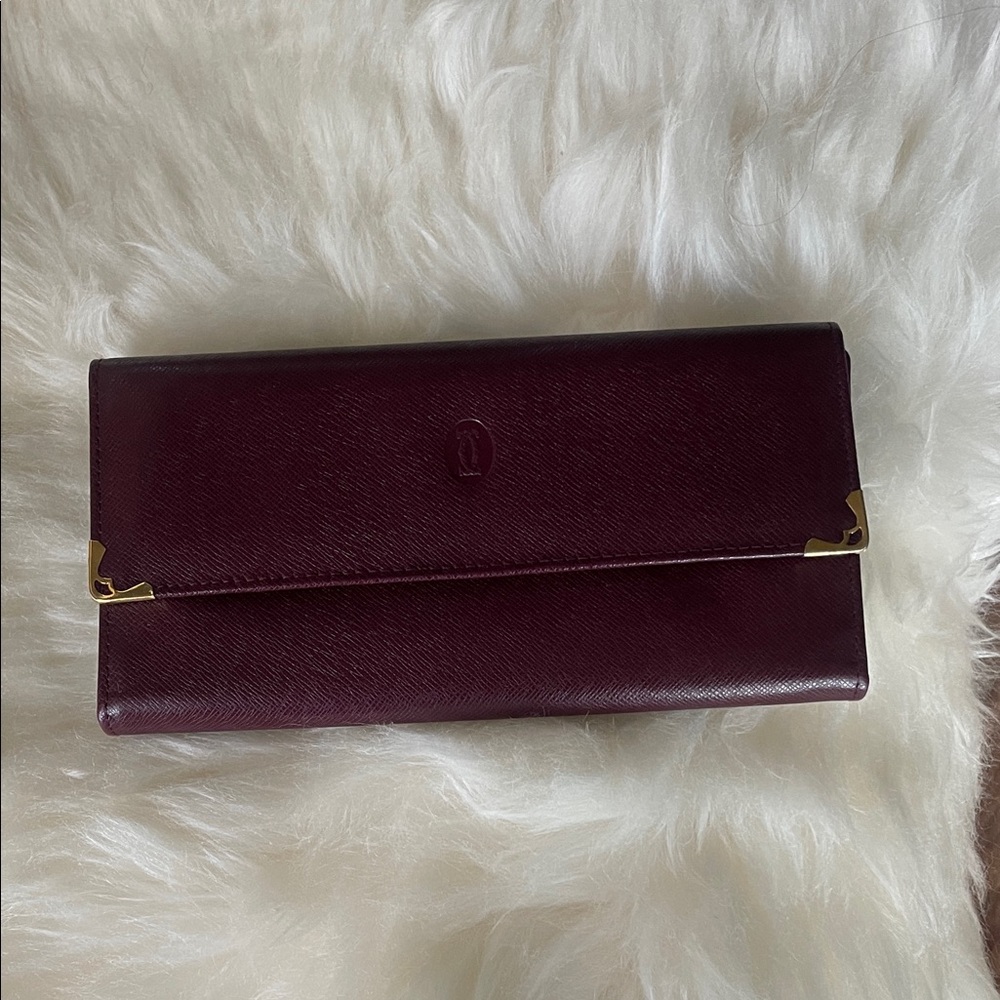 Cartier Deep Burgundy Leather Wallet with Gold Corner Accents